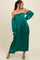 woman wearing a green off-the-shoulder maxi dress with long sleeves and ruffle details
