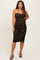 woman wearing a black floral strapless maternity dress with ruching and a fitted silhouette, showing her baby bump