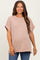 woman wearing a light pink ribbed maternity top with short sleeves and a relaxed fit, showing her baby bump
