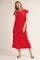 woman wearing a red cap sleeve maxi dress with a contrasting neckline detail