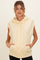 woman wearing a light yellow maternity hoodie with a relaxed fit and kangaroo pocket