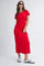 woman wearing a red short sleeve midi dress and sunglasses, paired with black and white athletic shoes
