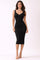 woman wearing a fitted black ribbed midi dress with a scoop neckline and slim straps