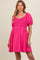 woman wearing a vibrant pink maternity dress with puff sleeves and a square neckline