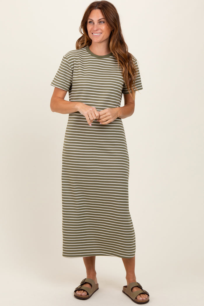 woman wearing a green and cream striped t-shirt midi dress with short sleeves and relaxed fit