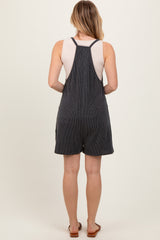 Black Solid Ribbed V-Neck Sleeveless Front Pocket Romper
