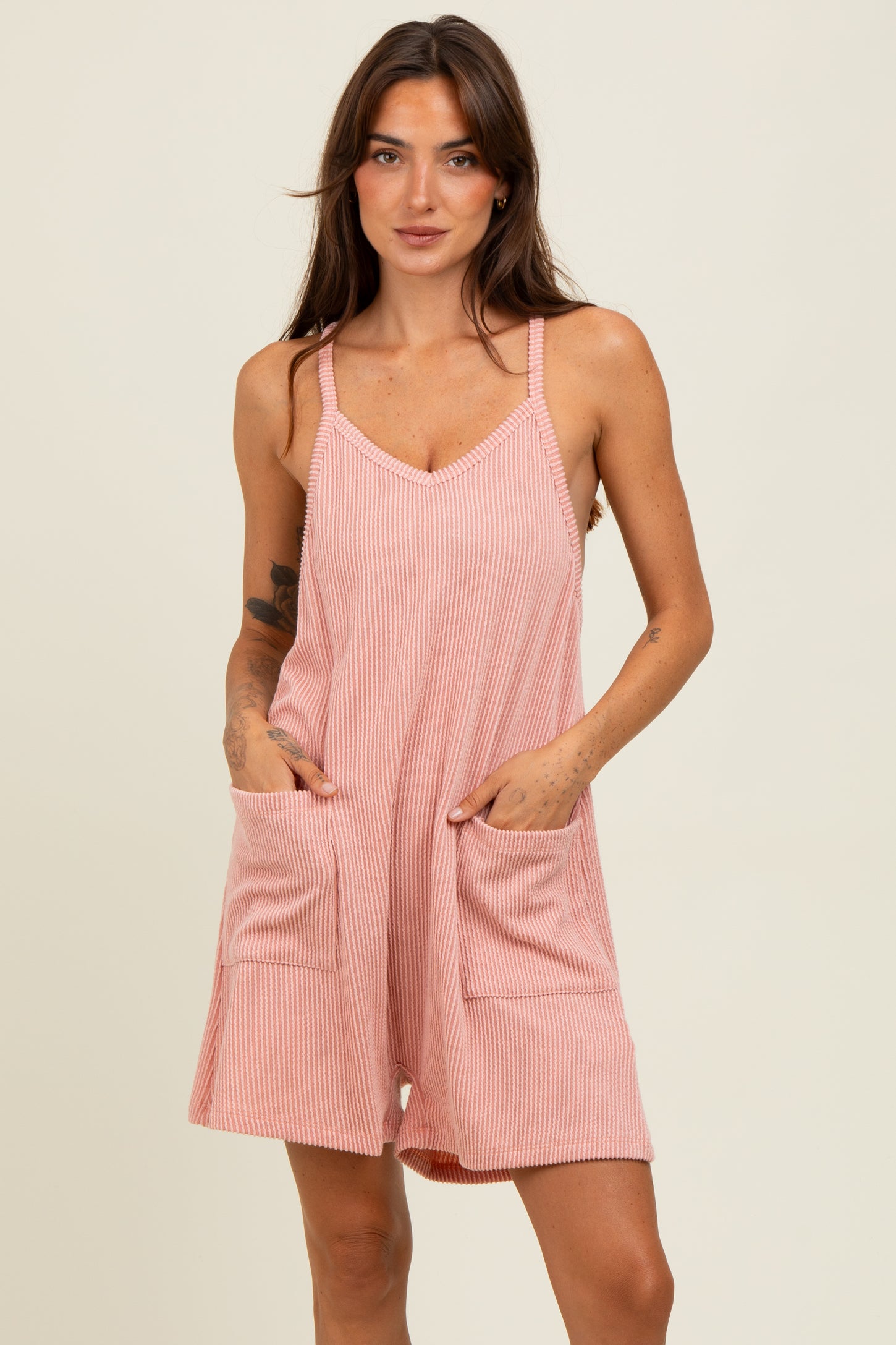 Mauve Solid Ribbed V-Neck Sleeveless Front Pocket Romper