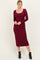 woman wearing a burgundy long sleeve fitted midi dress with a scoop neckline and form-fitting silhouette