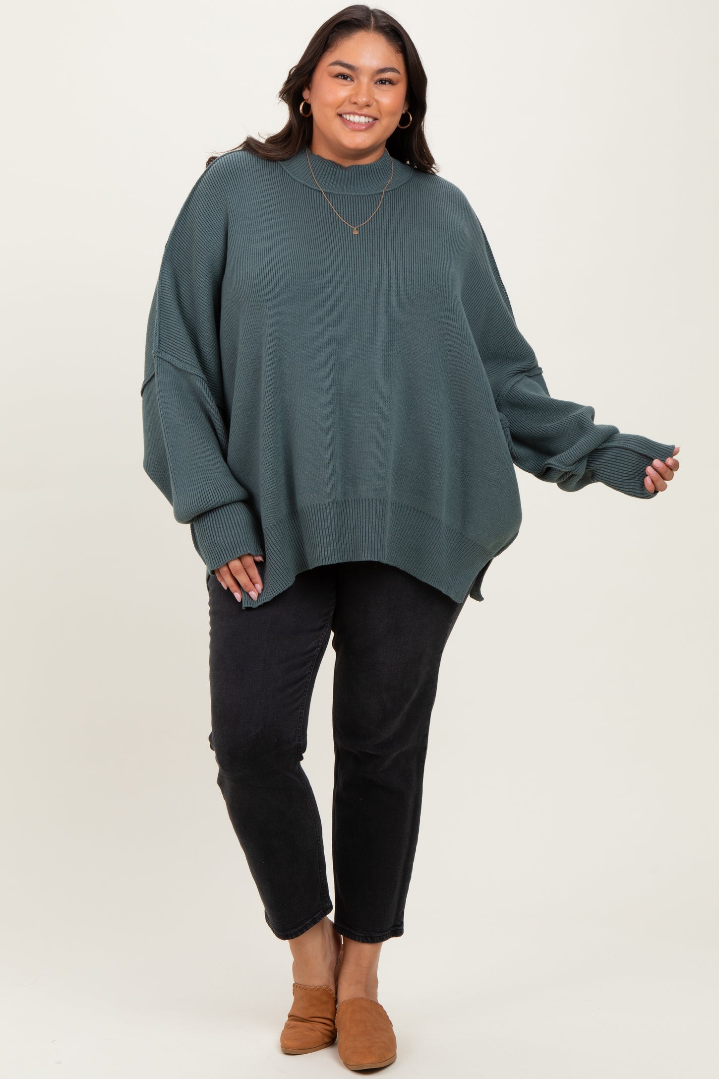 Jade Mock Neck Exposed Seam Sweater