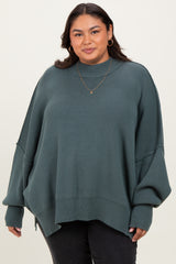 Jade Mock Neck Exposed Seam Sweater