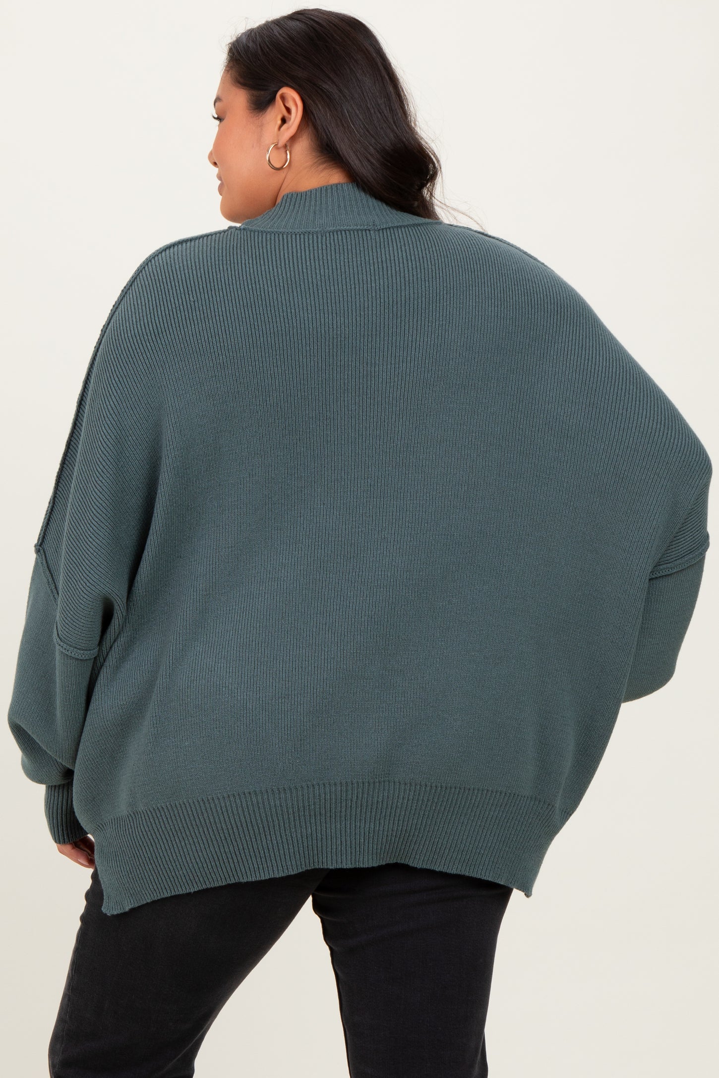 Jade Mock Neck Exposed Seam Sweater