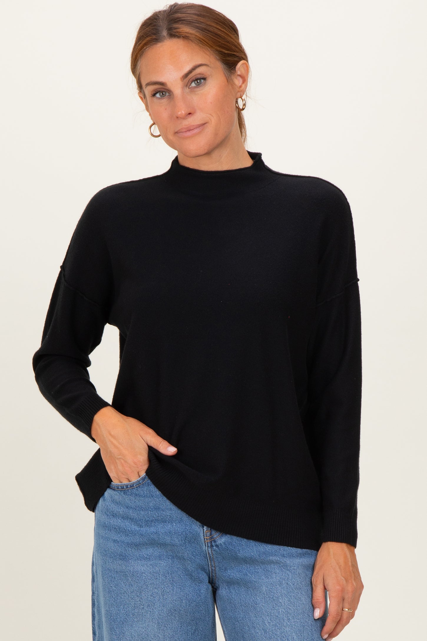 Black Mock Neck Exposed Seam Sweater
