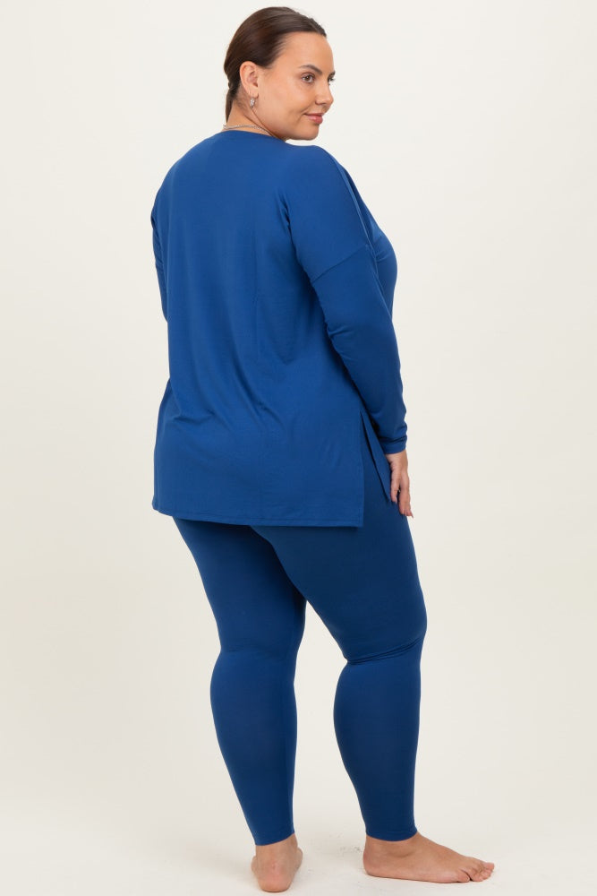 woman wearing a royal blue long sleeve top and matching leggings, showcasing a relaxed fit and side slit details