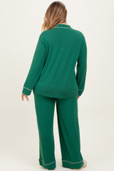 woman wearing a green maternity plus pajama set with long sleeves and pants, shown from the back