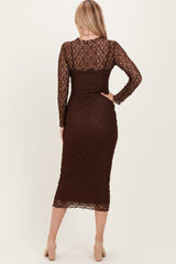 woman wearing a brown lace long sleeve midi dress, view from the back, fitted silhouette with a below-the-knee length