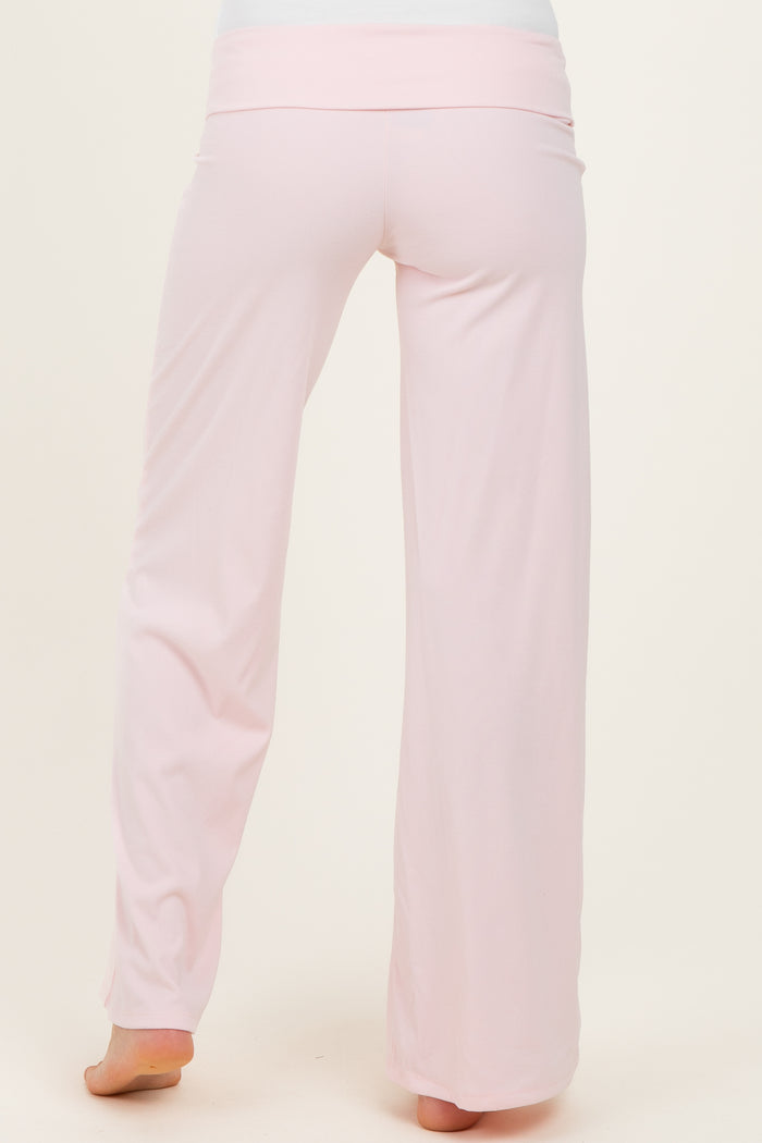 maternity wear light pink wide-leg pants shown from the back