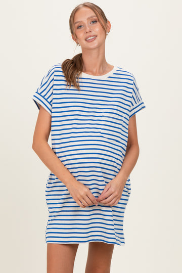 woman wearing a blue and white striped maternity t-shirt dress with a relaxed fit and short sleeves, holding her baby bump