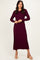 woman wearing a burgundy ribbed long sleeve midi dress with a fitted silhouette and scoop neckline