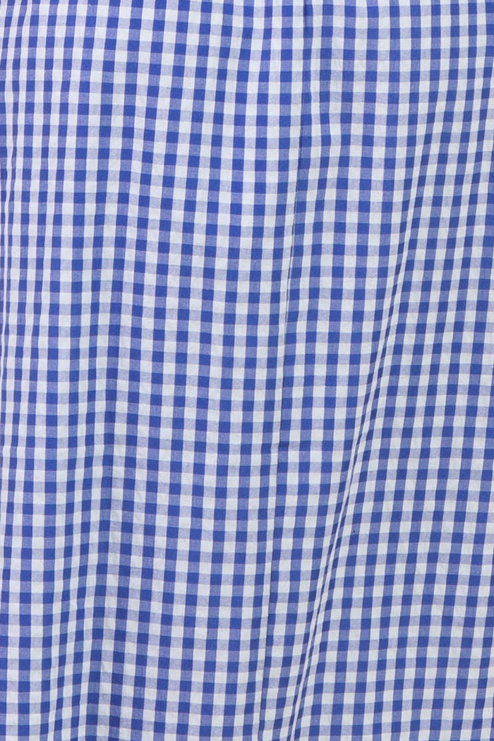maternity wear blue and white gingham patterned dress with a flowing silhouette