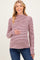 woman wearing a pink and burgundy striped maternity top with a mock neck and holding her baby bump