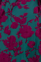 teal dress with burgundy floral embroidery details