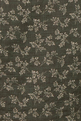 maternity wear in dark green featuring a delicate floral pattern with small white flowers