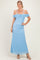 woman wearing a light blue off-the-shoulder lace maxi dress with a fitted silhouette and spaghetti straps
