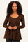woman wearing a brown long sleeve henley tunic with a flared peplum and button details