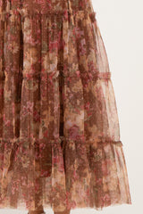 maternity wear floral tiered skirt in brown with pink and green accents, featuring sheer fabric and ruffle details