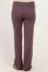 woman wearing purple maternity pants, shown from the back, with a soft waistband and relaxed fit