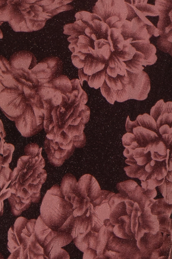 floral print maternity fabric in shades of dusty rose on a dark background