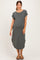 woman wearing a gray short sleeve maternity dress with a relaxed fit and side slits, showing her baby bump