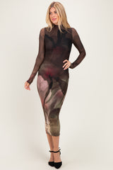 woman wearing a sheer long sleeve floral printed midi dress with a fitted silhouette