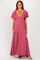 woman wearing a mauve maxi dress with short flutter sleeves and a deep v-neckline