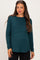 woman wearing a dark teal long sleeve maternity top with a layered design and a visible baby bump