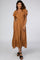 woman wearing a rust-colored midi dress with ruffle sleeves and a tiered hem