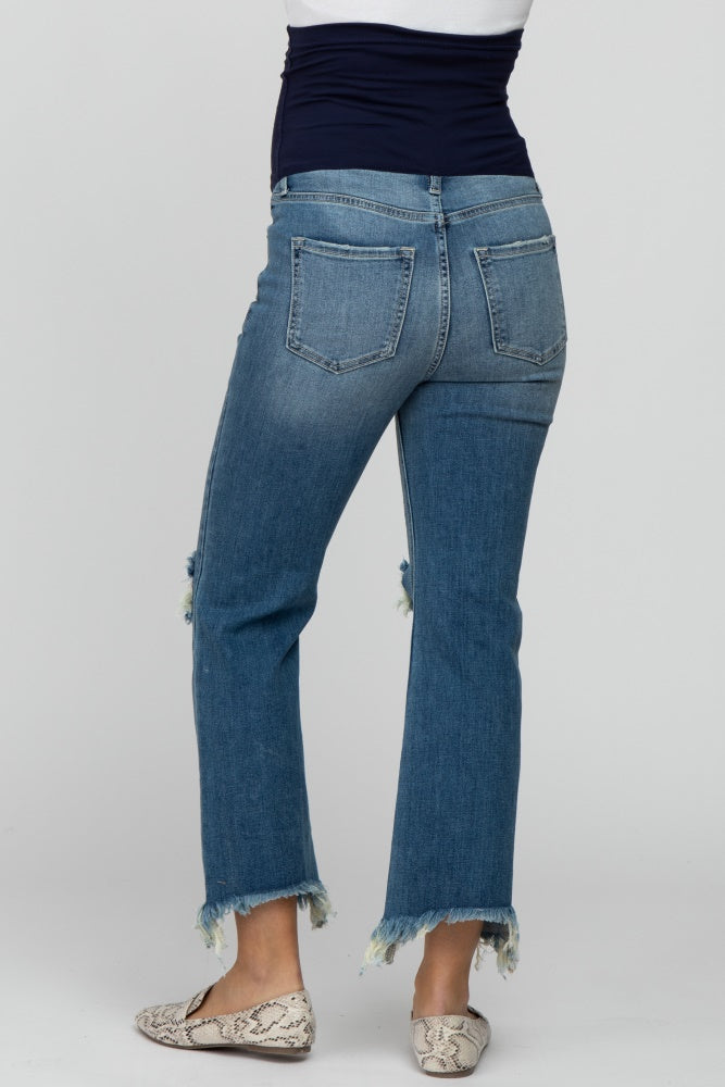 woman wearing distressed blue maternity jeans with a dark blue belly panel and frayed hem, seen from the back