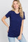 woman wearing a navy blue short sleeve t-shirt with a round neckline and relaxed fit