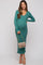 woman wearing a green ribbed maternity dress with a v-neckline and a visible baby bump, holding a handbag