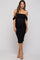 woman wearing a black off-the-shoulder maternity dress with ruching and showing her baby bump