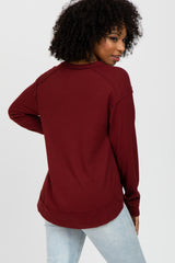 Burgundy Split Neck Exposed Seam Long Sleeve Top